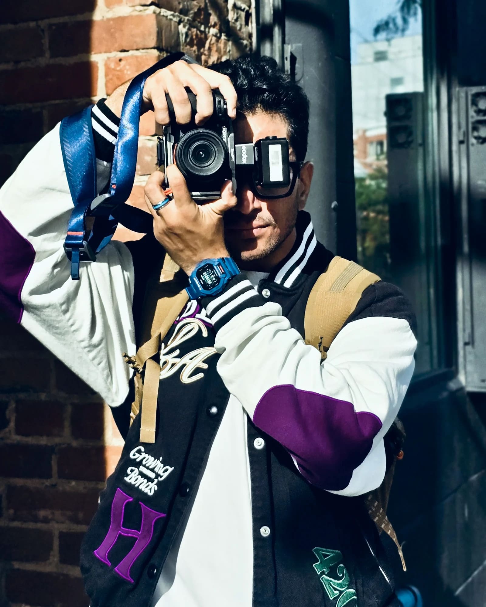 Jowan photographing a subject from the subject's point of view